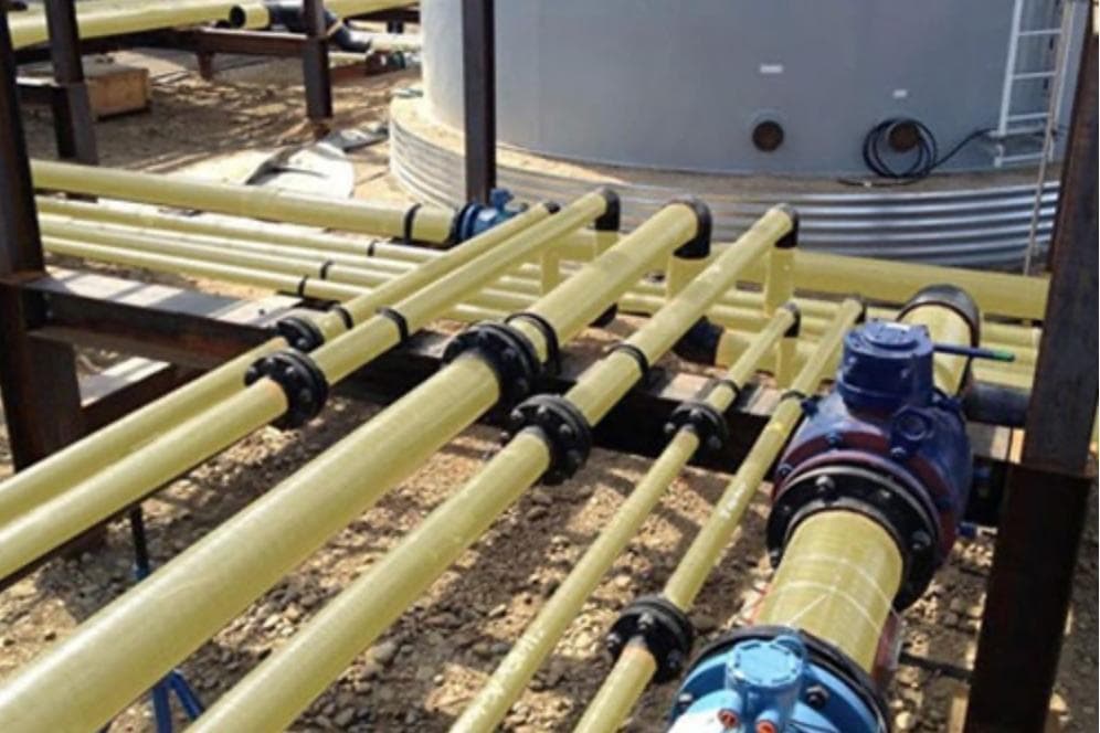 Installed FRP pipework with flanged connections and isolation valves