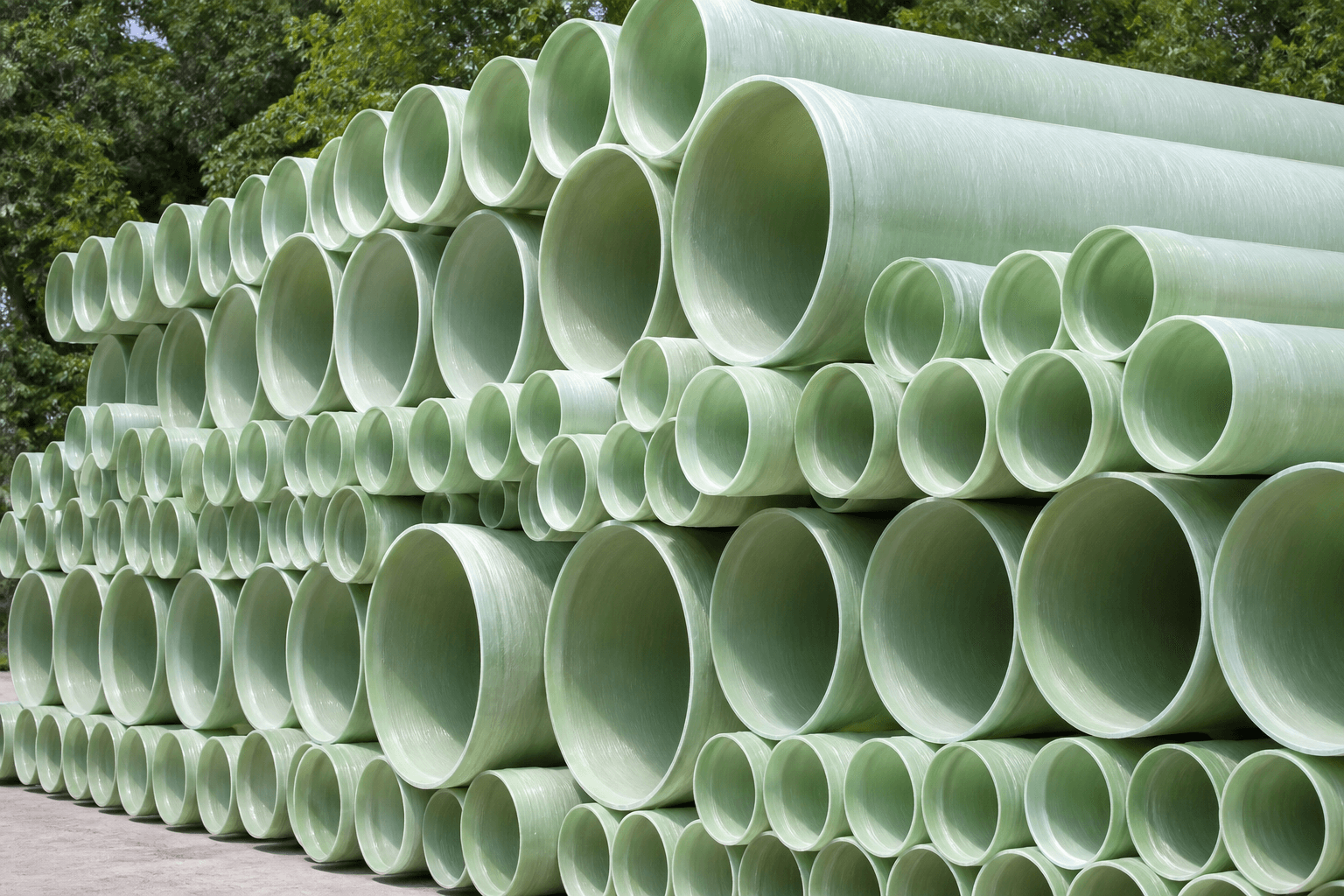 Stacks of glass reinforced plastic pipes in multiple diameters