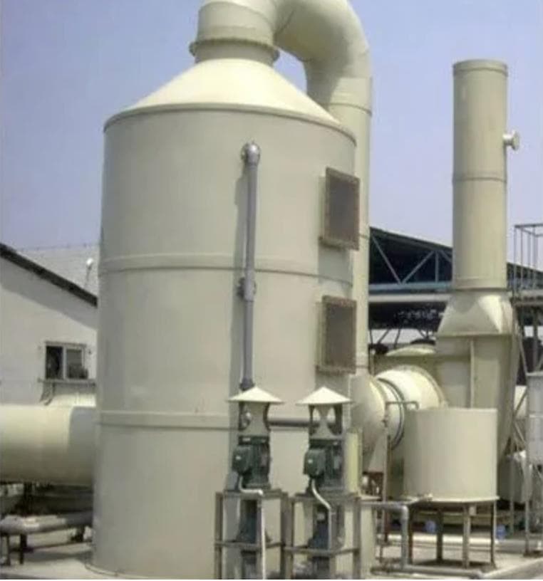 FRP packed-bed scrubber with circulation pumps and exhaust stack