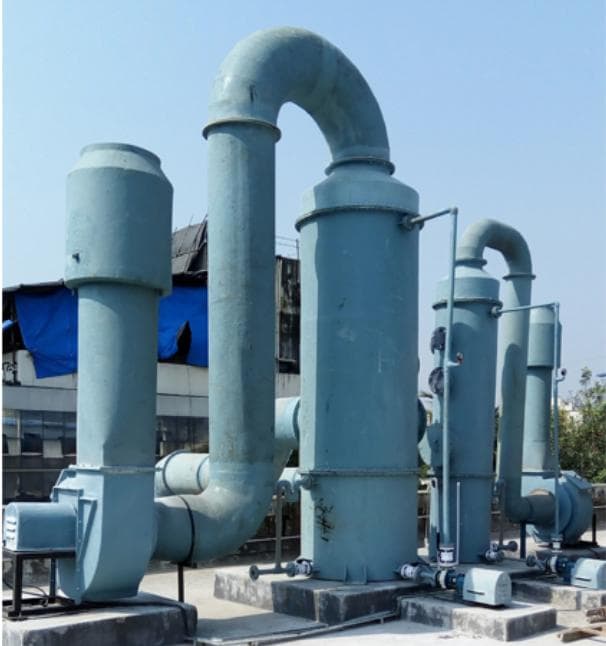 Multiple wet scrubber units operating as an integrated fume-control system